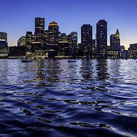 The Boston Skyline at twilight from Boston Harbor vantage point